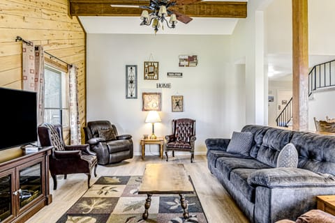 TV, fireplace, books