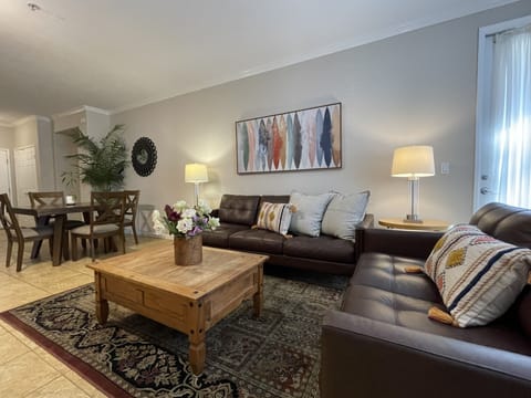  Spacious and inviting living room designed for comfort and versatility.