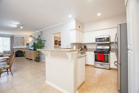 Gourmet kitchen, featuring new appliances