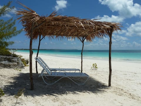 On the beach, sun loungers, beach towels