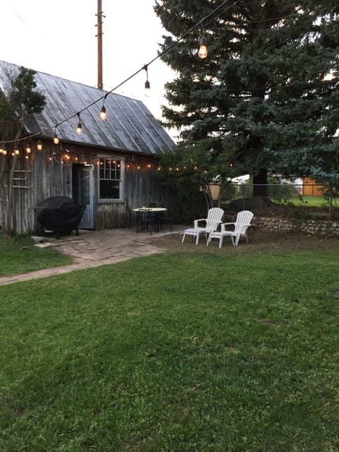Lighted Back Patio w/ Gas Grill and Table