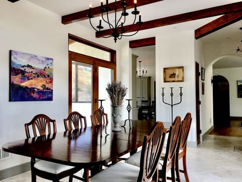 Dining room adjacent to the kitchen and family room.