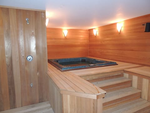 Relax in the comfort of a private, indoor hot tub in a cedar lined spa