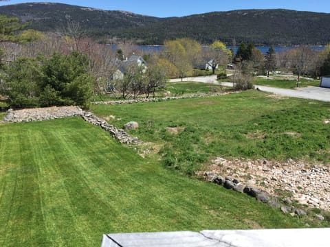 View from your deck of our lovely landscaped yard,  Somes Sound and mountains