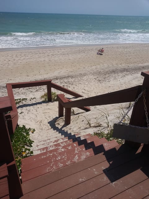 On the beach, sun loungers, beach towels