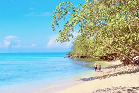 On the beach, sun loungers, beach towels