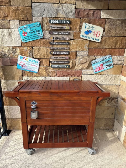 Rolling beverage cooler in the cabana for the hot days at the pool.