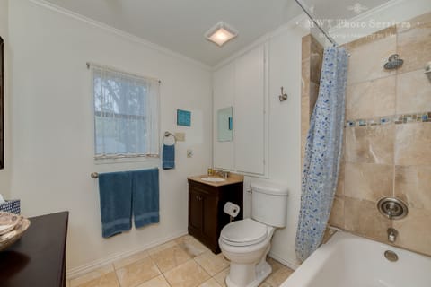 Combined shower/tub, hair dryer, towels, soap