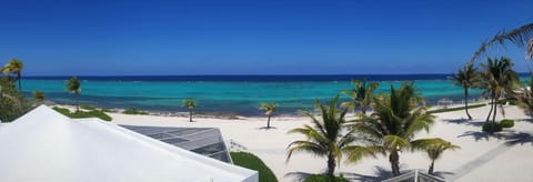 On the beach, sun loungers, beach towels