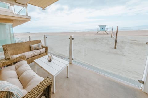 Stunning view from back deck, you are on the sand!  Watch the sunset here!