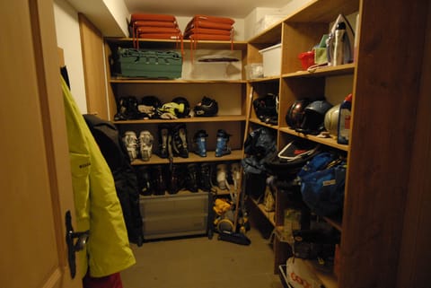 The ski room, with direct access to the garage.