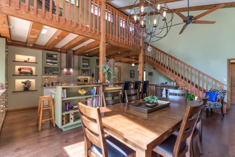 Dining area seating for 10-12 with additional bar seating 