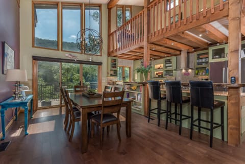 Another view of Dining area and Kitchen overlooking deck and lake