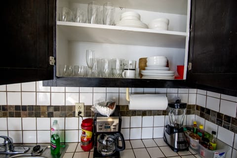 Fridge, oven, coffee/tea maker, cookware/dishes/utensils