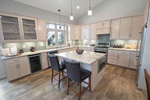 Beautiful open kitchen with stainless steel appliances.