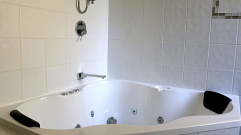 Combined shower/tub, hair dryer, bathrobes, slippers