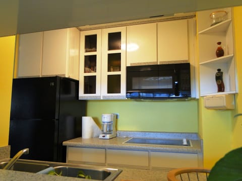 Fridge, microwave, stovetop, coffee/tea maker