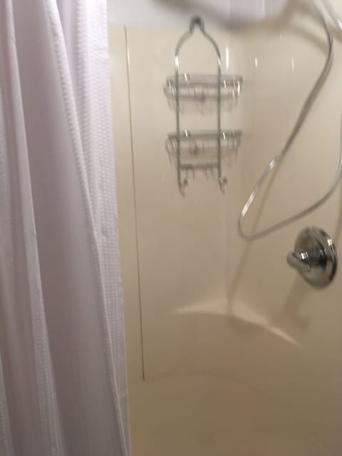 Combined shower/tub, hair dryer, towels, soap