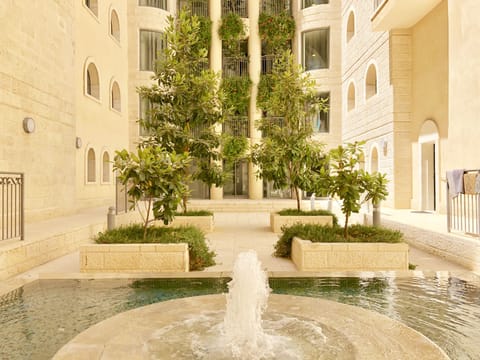 Sit down & unwind by this beautiful quiet waterfall just outside the apartment!