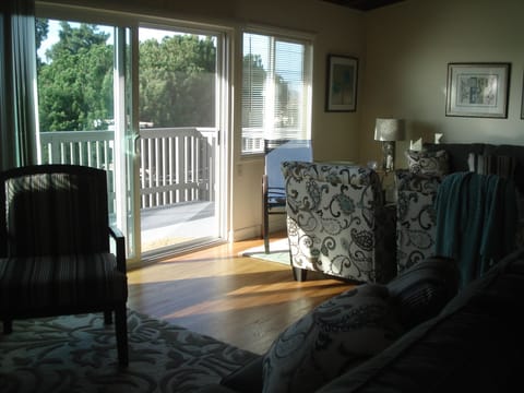 Large Living Room Space...two seating areas with view and deck
near kitchen.