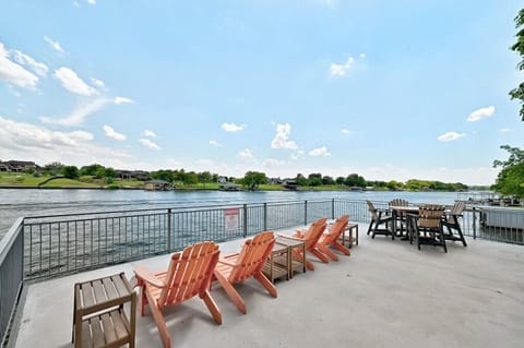 Sitting area above boat dock with views of  lake!  Upper deck views of the lake!