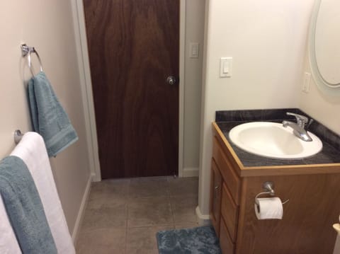 Combined shower/tub, hair dryer, towels, soap