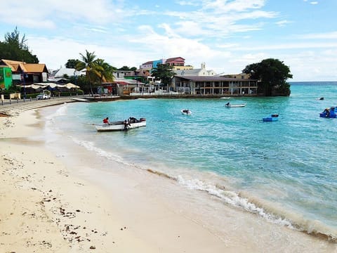 On the beach, sun loungers, beach towels