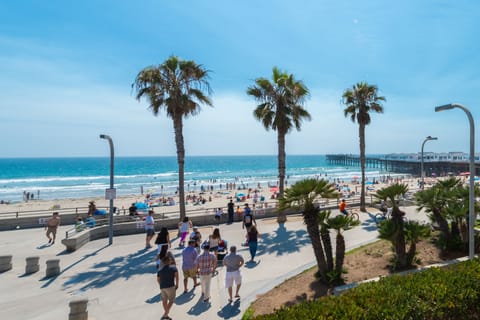 On the beach, sun loungers, beach towels