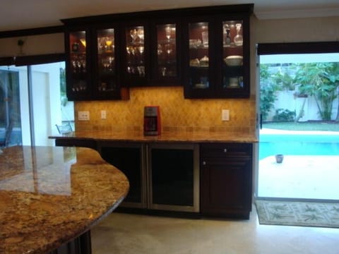Granite Bar Area with Wine and Beer Coolers