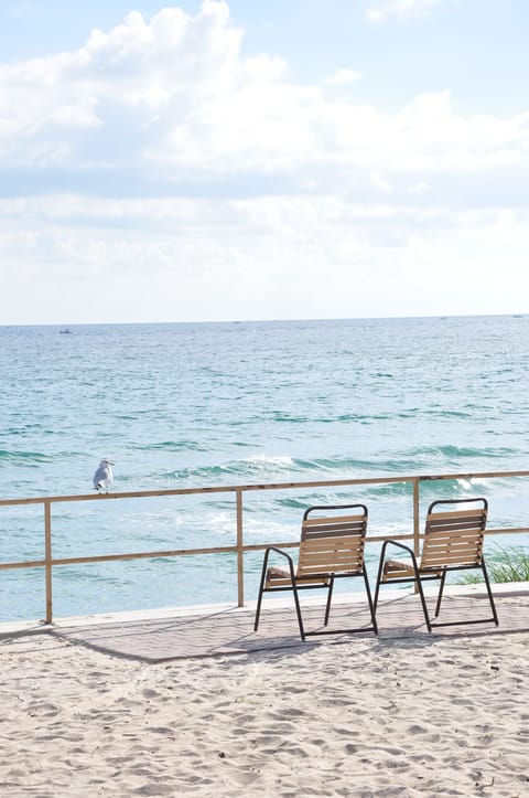 On the beach, sun loungers