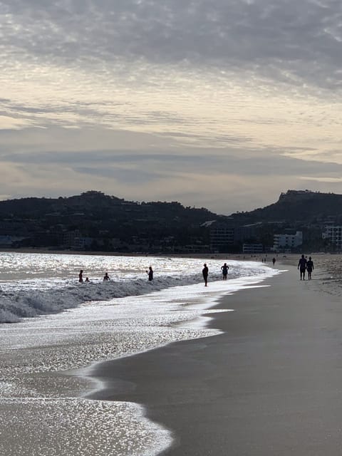 On the beach, sun loungers, beach towels