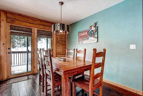 Dining table expands to accommodate 8-10 people (8 matching chairs).