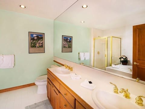 Get ready for the day in the bright bathroom.