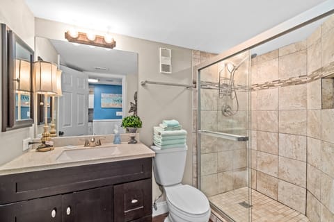 Combined shower/tub, hair dryer, towels, soap