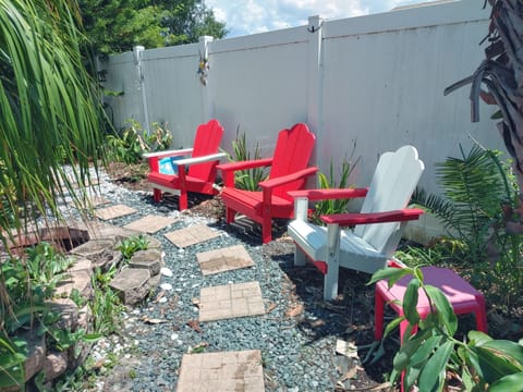 Backyard as of 5/28/23 with new outdoor weather proof chairs