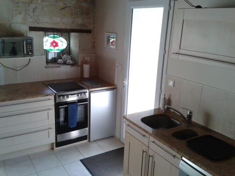 Modern kitchen with full size cooker