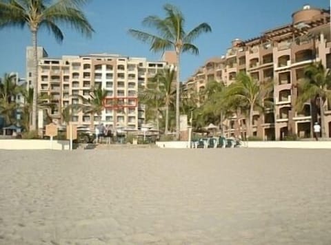 On the beach, sun loungers, beach towels