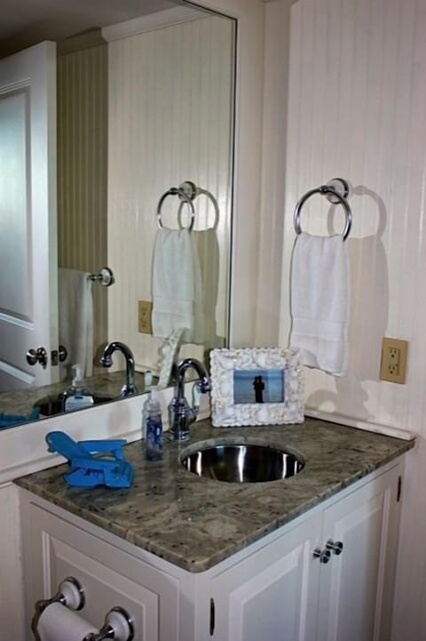 Combined shower/tub, hair dryer, towels, soap