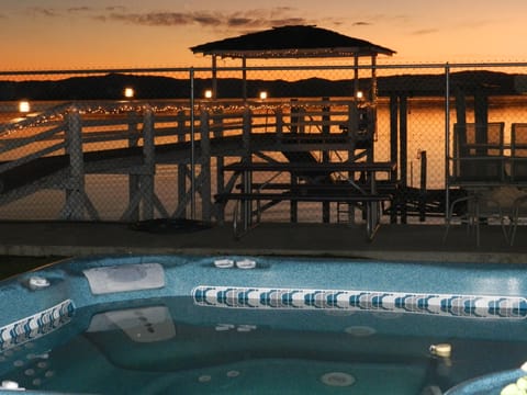 Sit in the hot tub and enjoy a sunset with a glass of wine.
