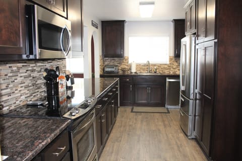 Kitchen has just about anything you could need for serving, eating, and cooking.