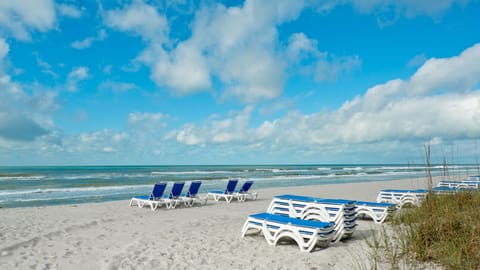 We have new comfortable beach chairs on our beach, umbrella is in the unit