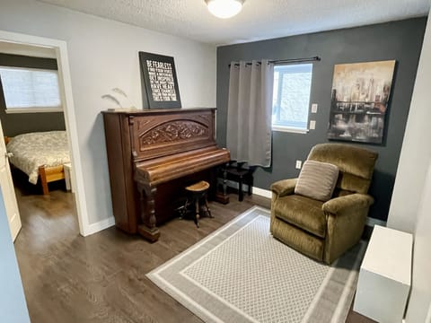 sitting area with piano