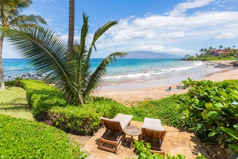 On the beach, sun loungers, beach towels