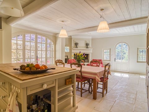 Furniture, Property, Table, Window, Interior Design, Wood, Chair, Lighting, Houseplant, Floor