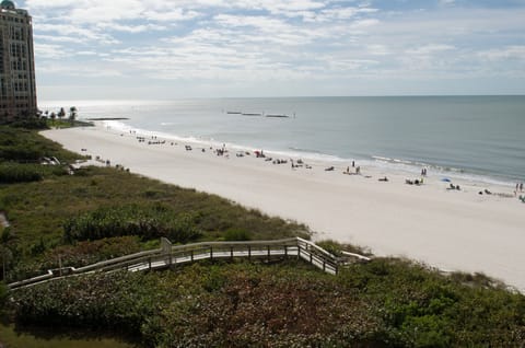 On the beach, sun loungers, beach towels