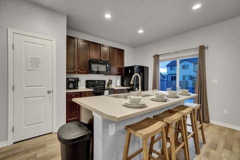 Large pantry includes all essentials like cooking oils, seasonings, coffee, etc