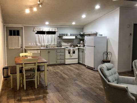 Open floor plan allows Kitchen, Dining, and Living areas to flow together.