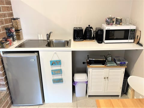 Fridge, microwave, coffee/tea maker, electric kettle