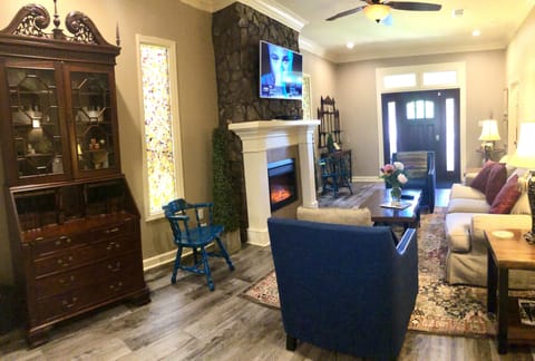 Living room with Smart TV and electric fire place!