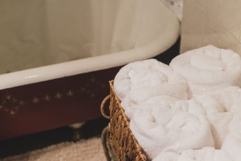 Combined shower/tub, hair dryer, towels, soap